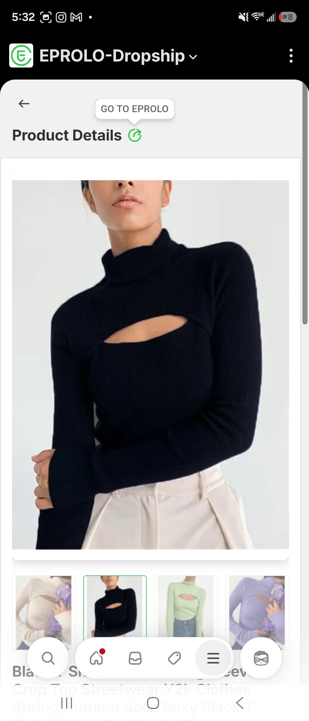 Black knitted long sleeve crop top with cut-out detail